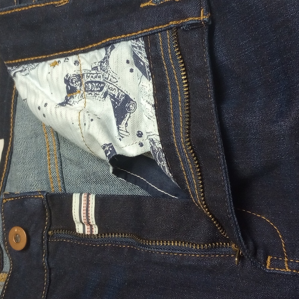 PILCRO BY ANTHROPOLOGY DARK WASH DENIM HIGH RISE BOOTCUT JEANS WITH SIDE BUTTONS - Picture 13 of 15